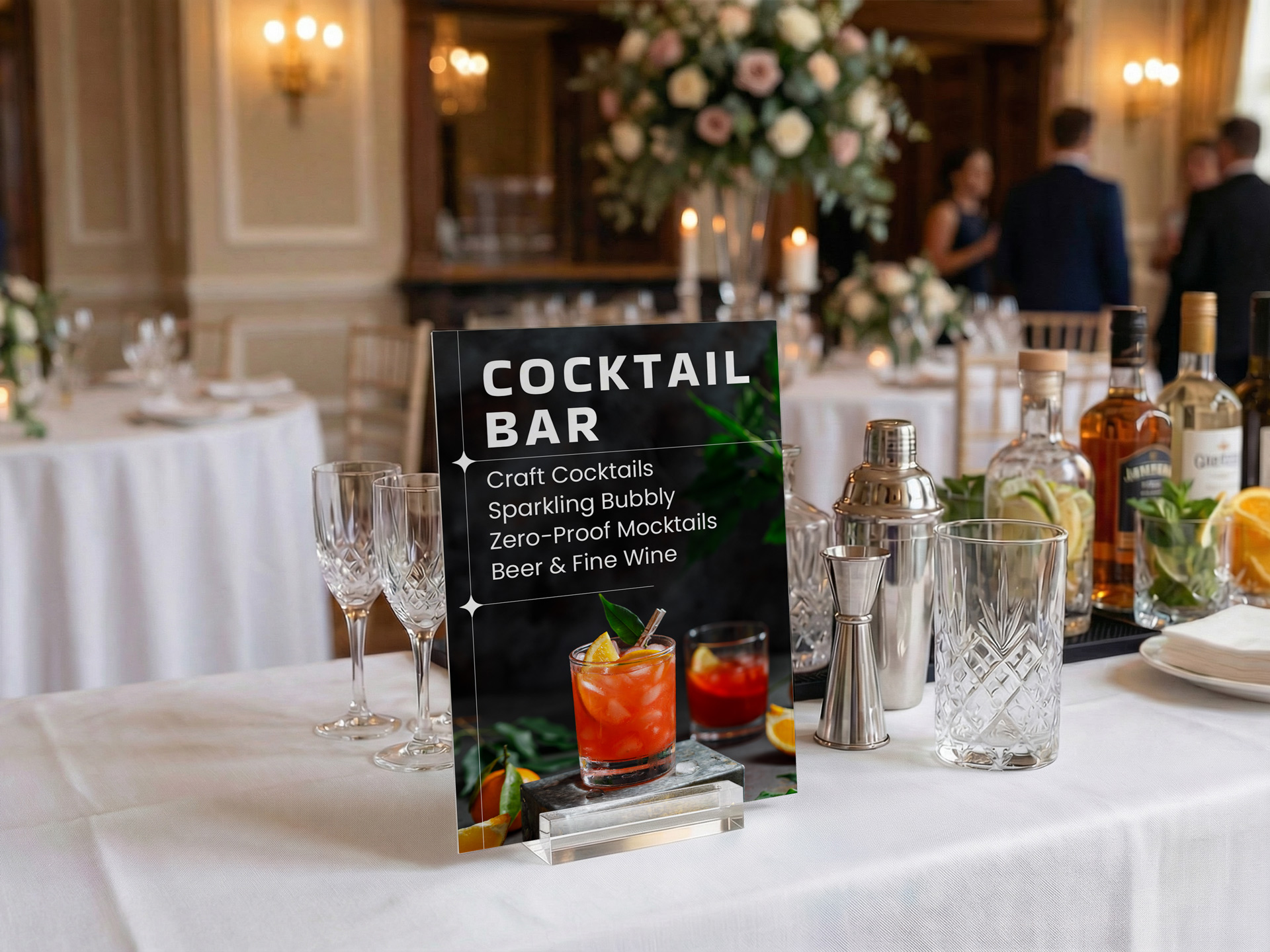 Black cocktail bar sign with drink photos