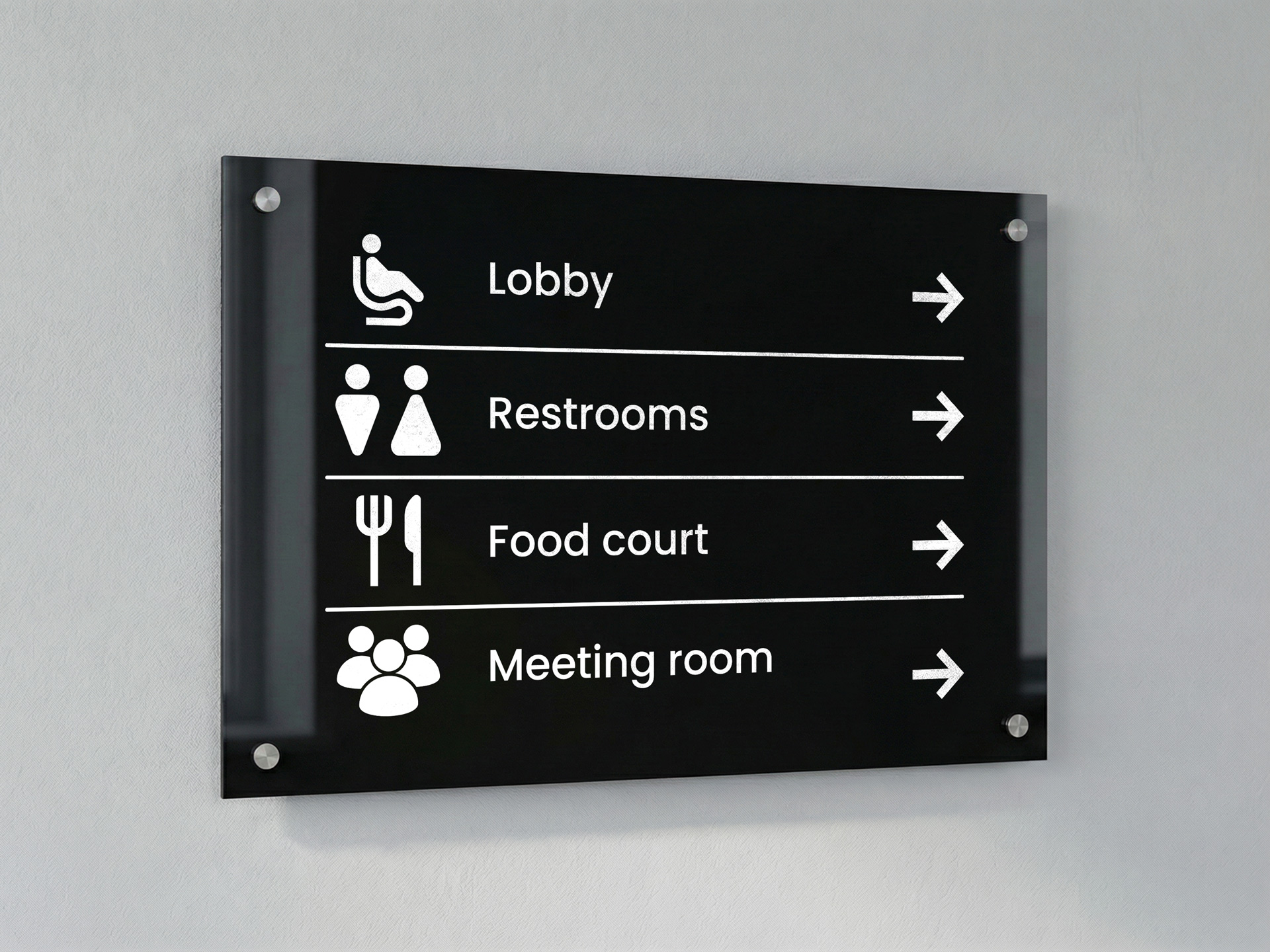black acrylic interior wayfinding signage with arrows