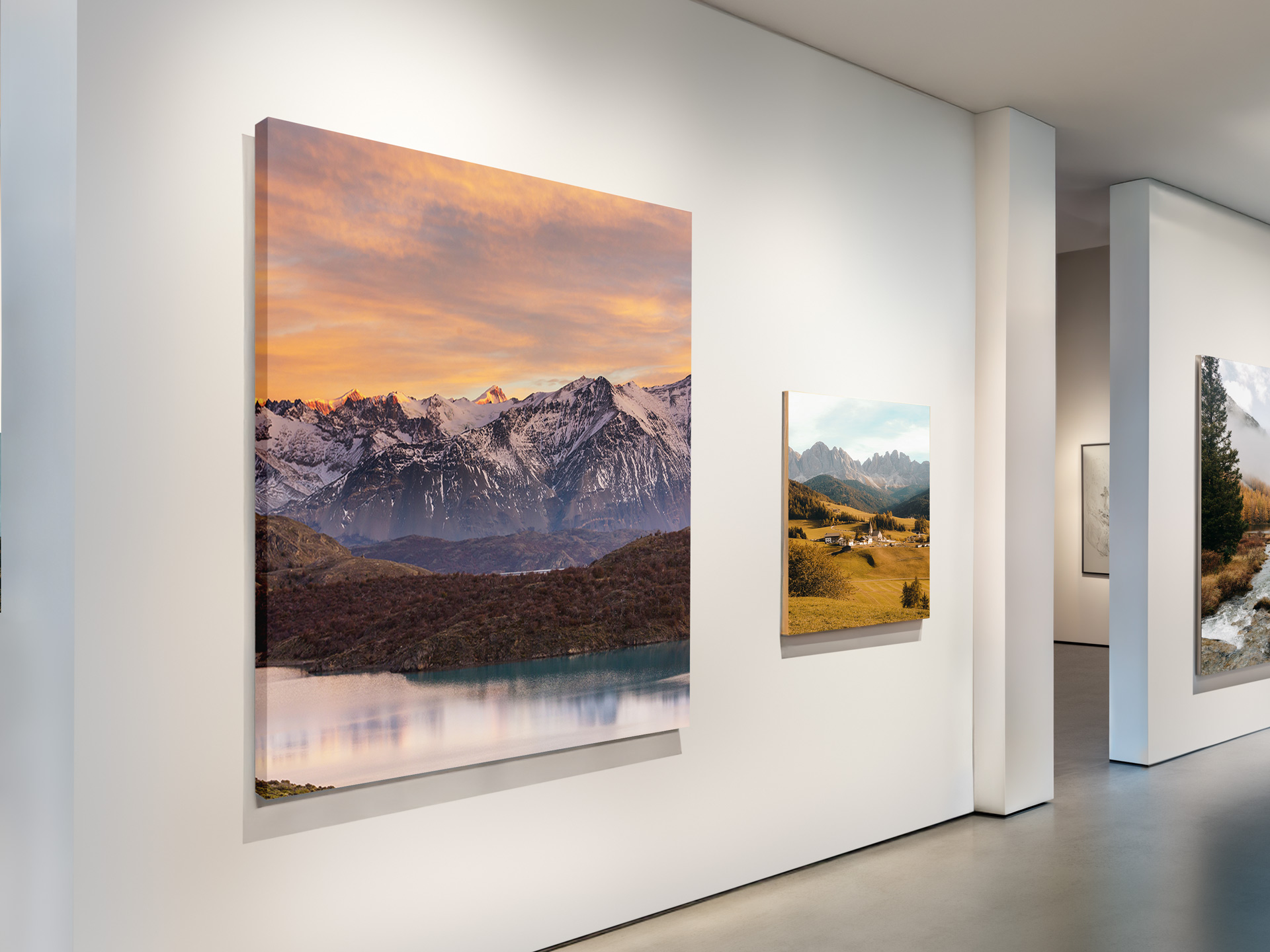 A mountainous wall art print displayed for an exhibition