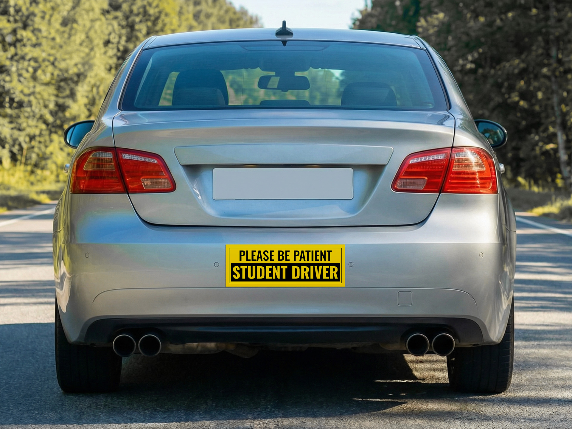 Safety bumper sticker reading "Please Be Patient," "Student Driver"
