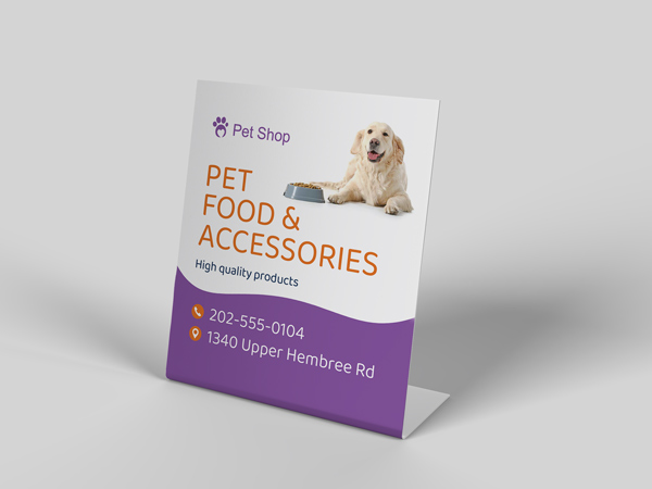 L-shaped pedestal sign for pet food and accessories featuring a happy dog illustration.