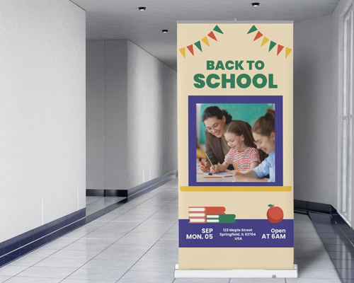 Lively back to school banner featuring students studying with bunting decoration.