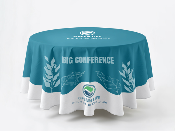 A blue and white table cover for a company presenting itself at a conference.
