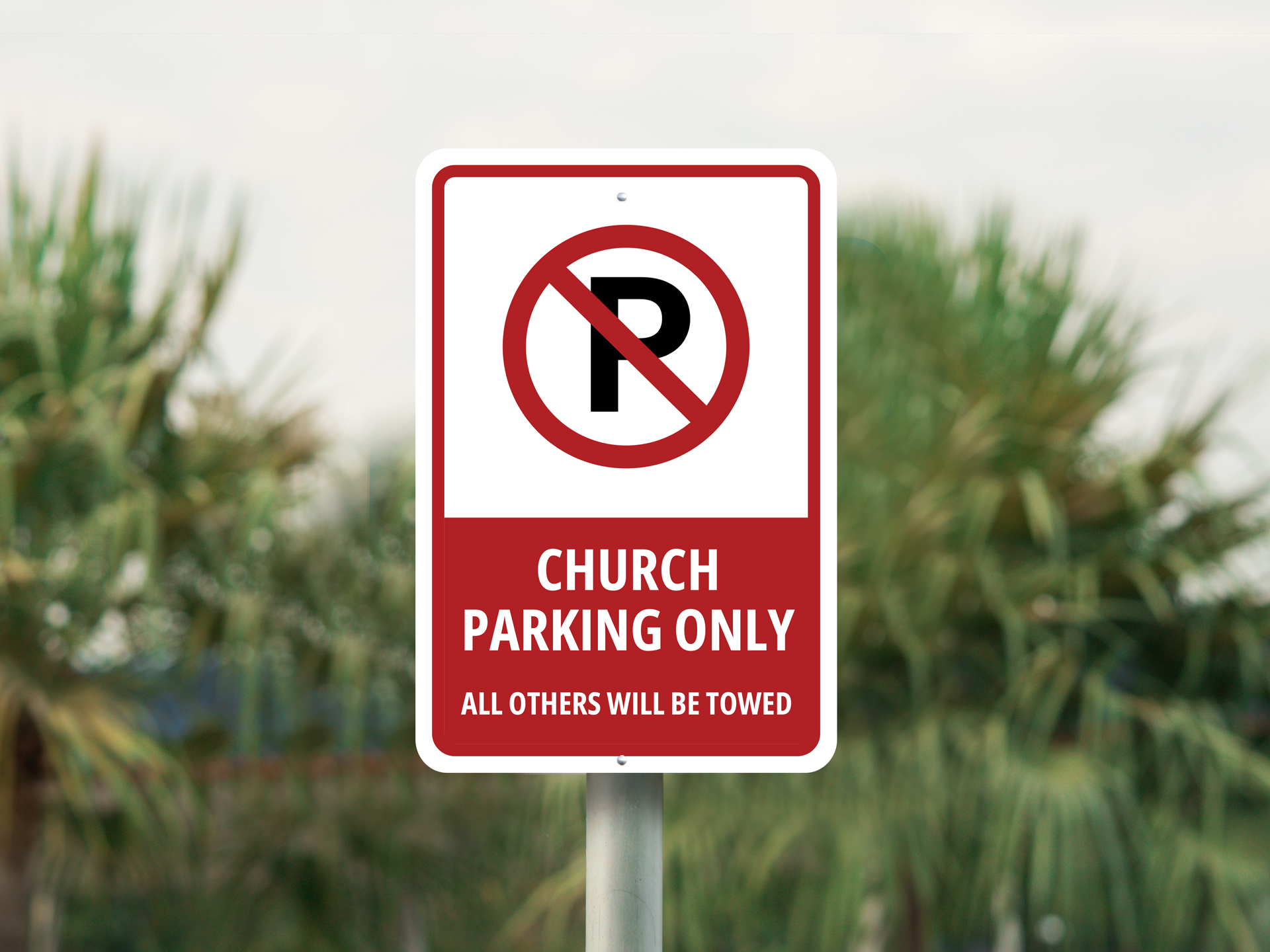 Prohibition mark church parking only sign with a warning message.