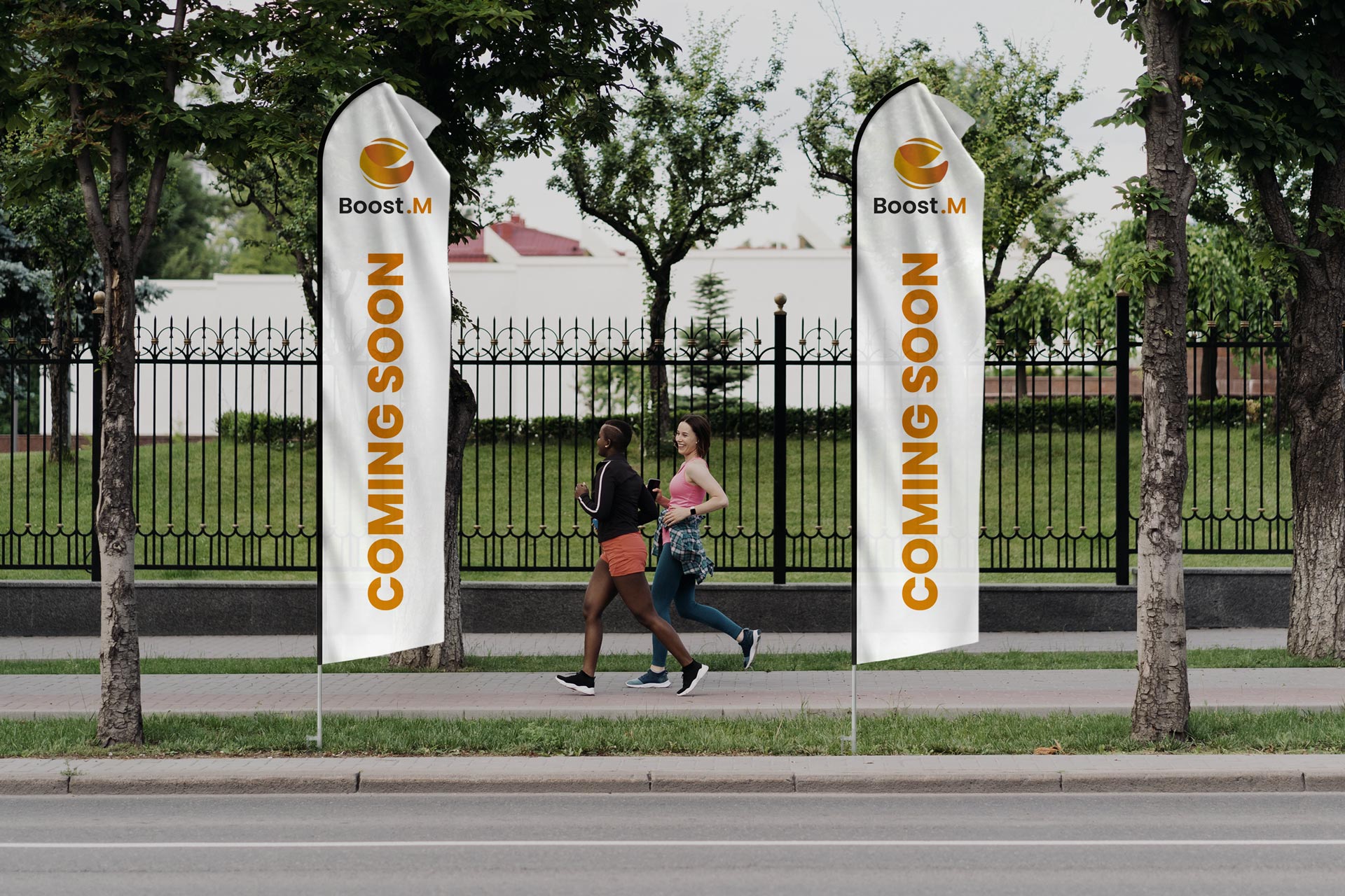 two-econo-feather-flags-with-coming-soon-branding-displayed-outdoors