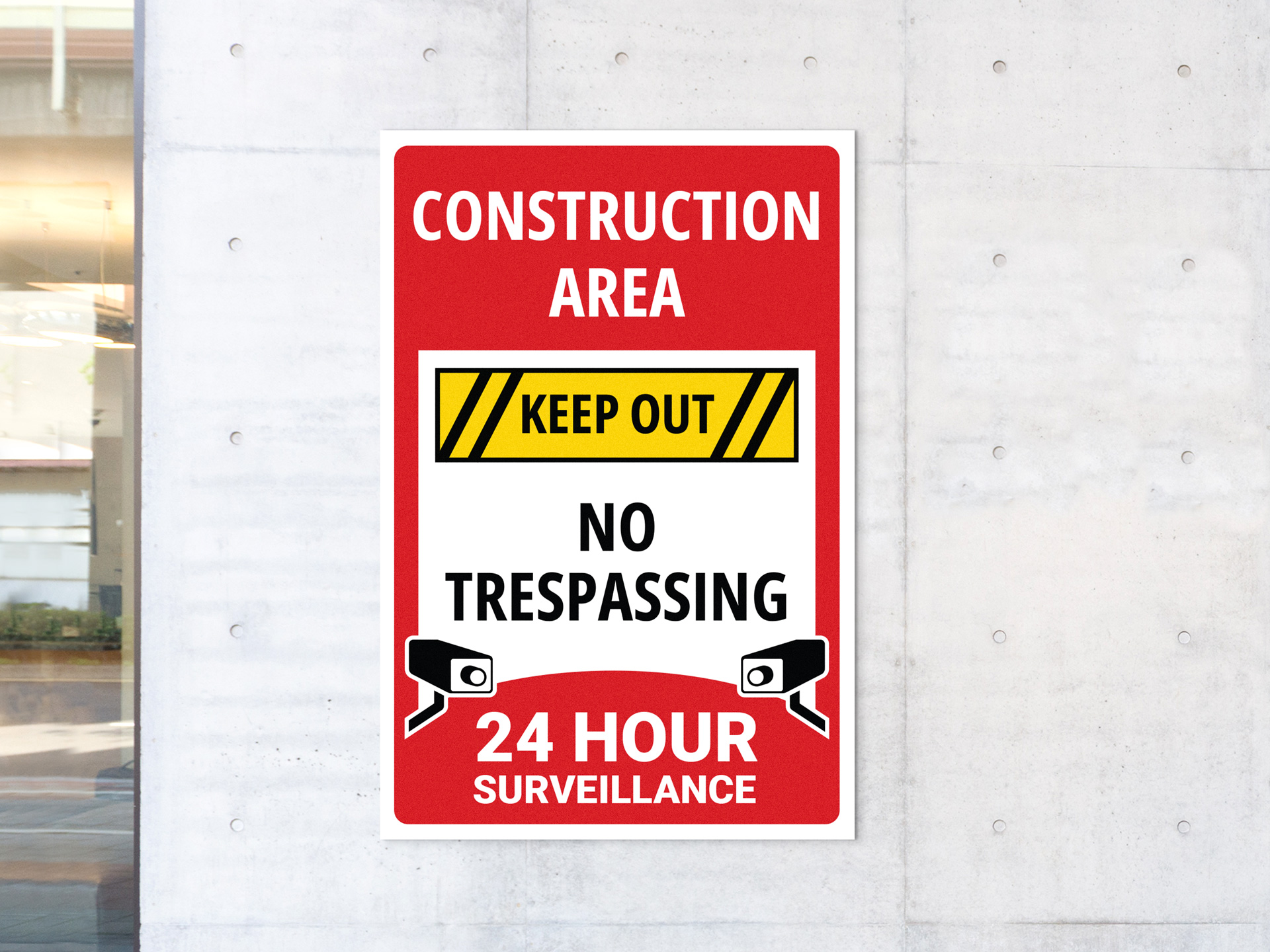 a twenty-four hour surveillance no trespassing sign for a construction area.