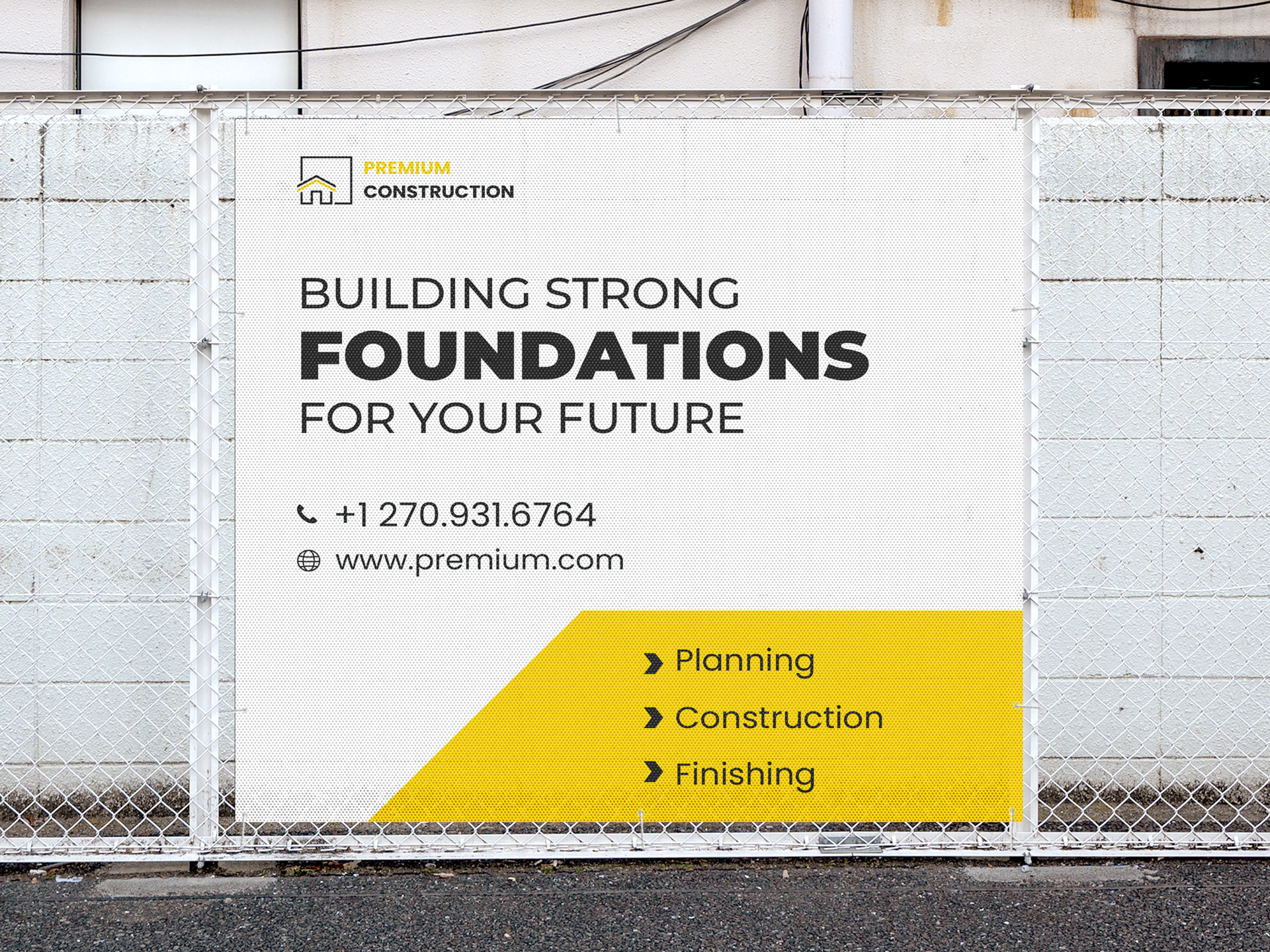 Custom construction fence banner with company branding and services