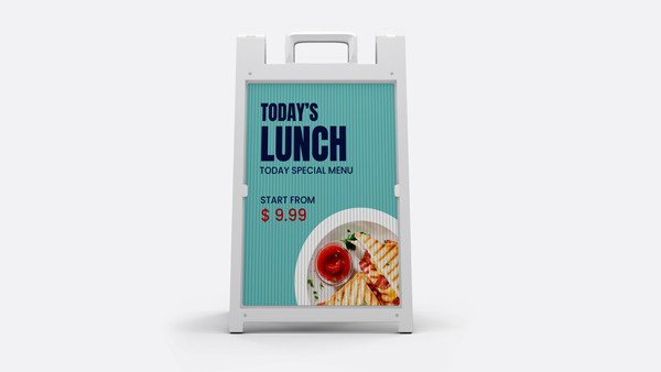 A white quick-change sandwich board with a restaurant's daily menu displayed on a corrugated insert.
