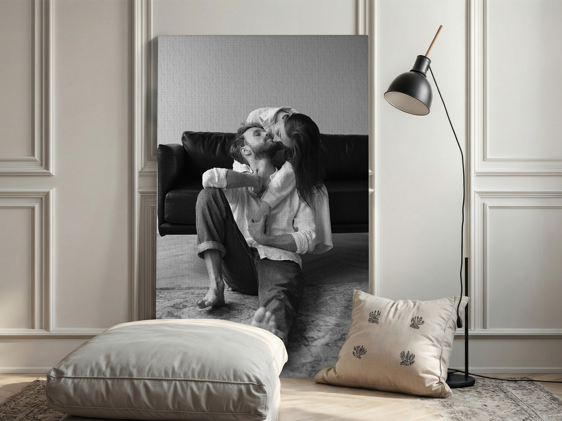 A monochrome photo of a couple printed on a large canvas