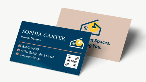 Standard size business cards in blue and beige, featuring the designer's name and contact details