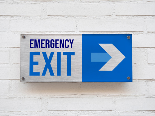 Wayfinding brushed aluminum emergency exit sign with a blue and white arrow.