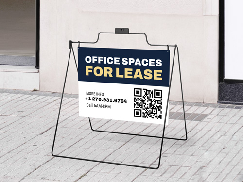 Open Spaces For Lease real estate sign in blue displaying a QR code and information.