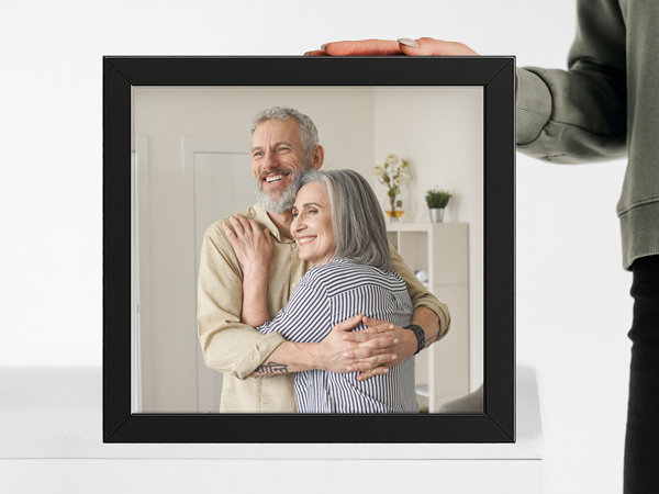 A beautiful framed canvas prints featuring an image of a happy couple.