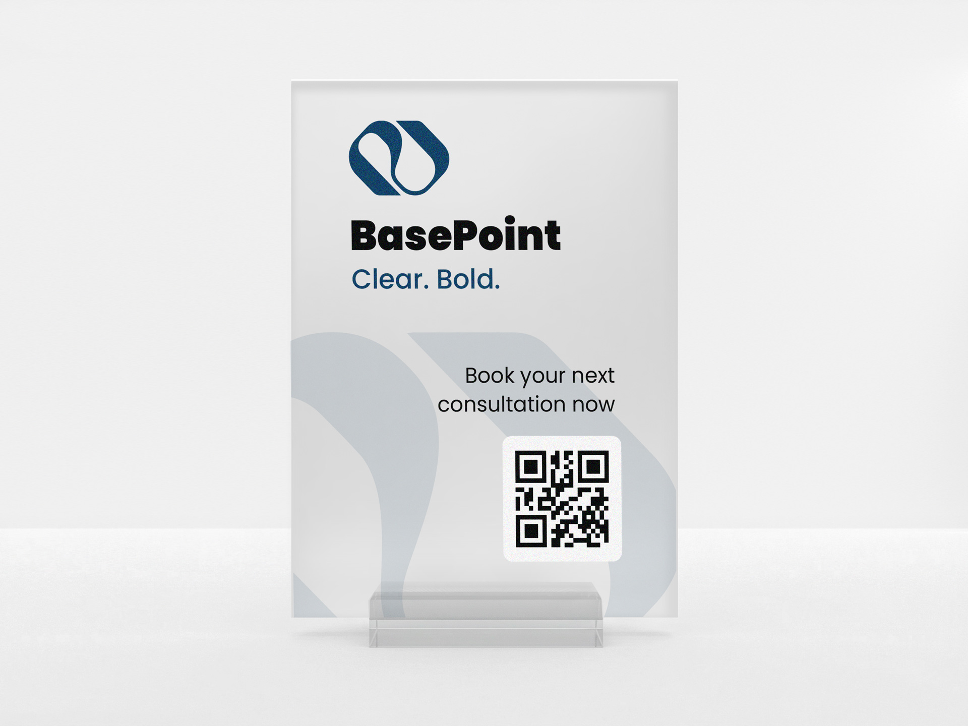 Commercial frosted acrylic table sign urging to book the next consultation along with a QR code.