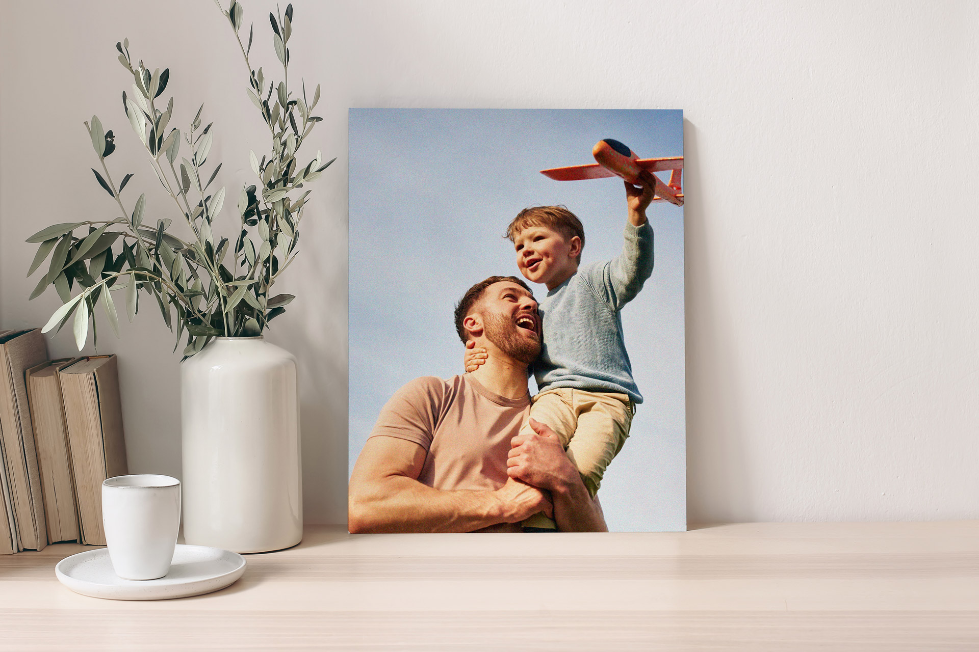 A foam board printing of a happy father and son having fun outdoors