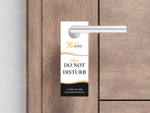 A beautiful door hanger for hotels reading Do Not Disturb.