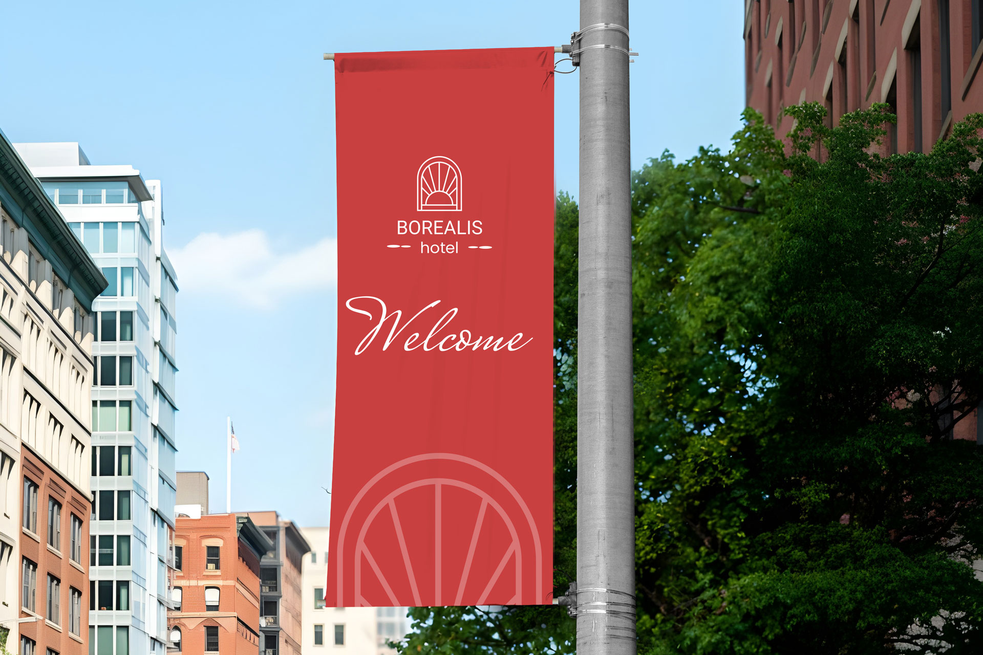 Vivid street pole banner welcoming visitors to Borealis hotel.