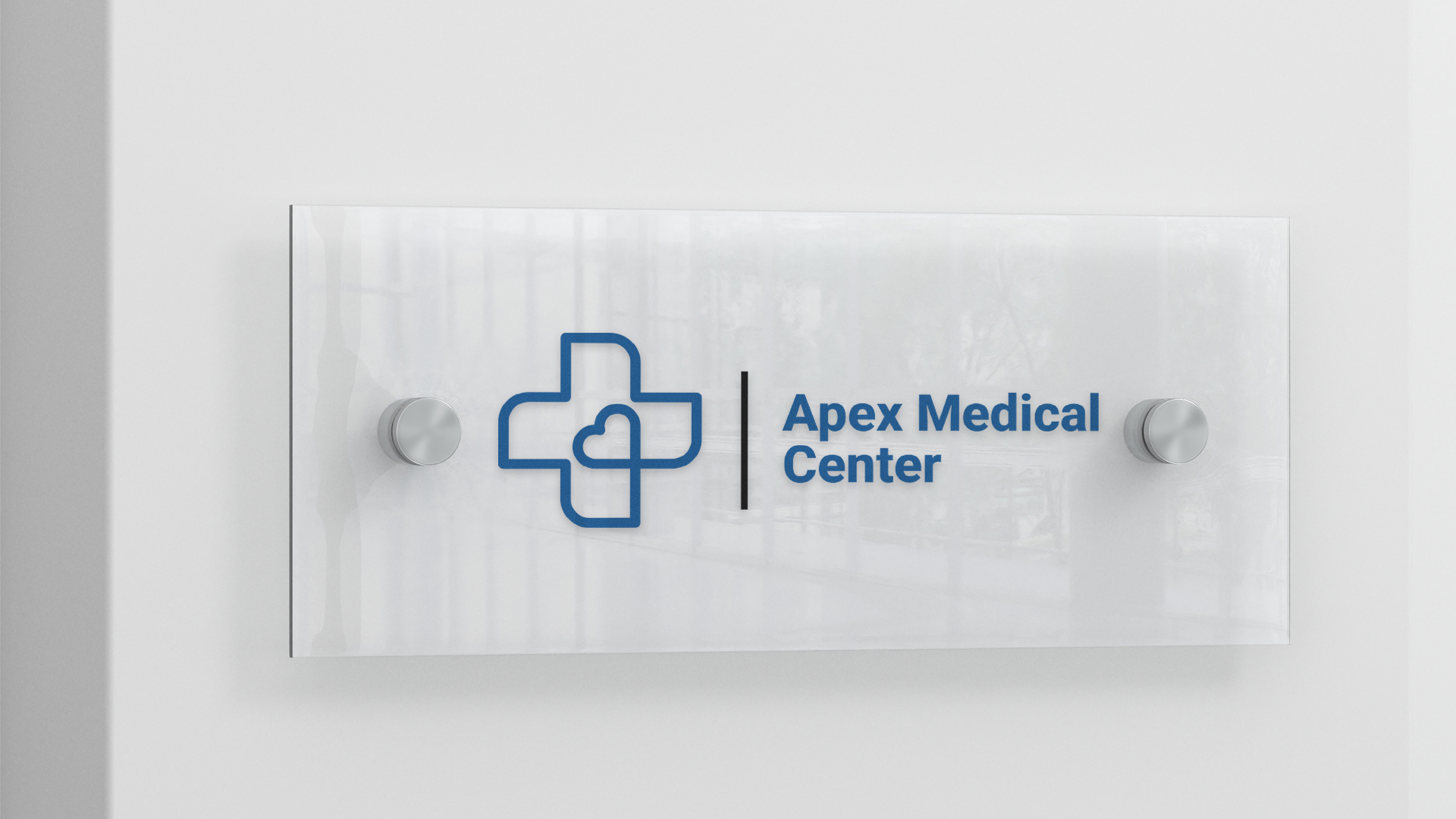 A clear acrylic plaque with a logo of a medical clinic printed in the center and mounted on the wall with standoffs.