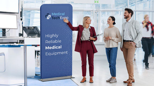 Medical tech expo display showcasing a presentation with the text Highly Reliable Medical Equipment