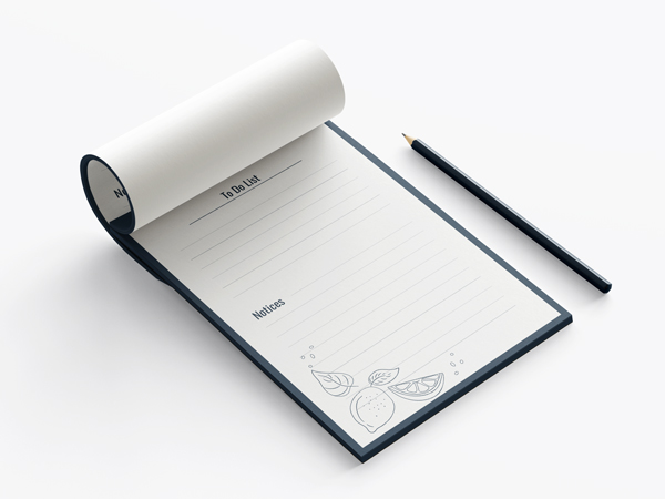 Notepad printing with minimalistic "To Do List" title, citrus fruit illustrations, and a black pencil nearby