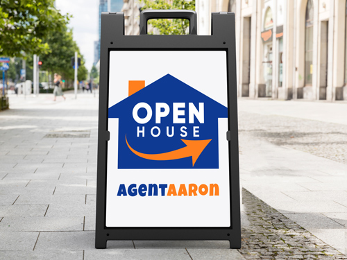 Wayfinding real estate sign guiding visitors to a property's open house with an agent name.