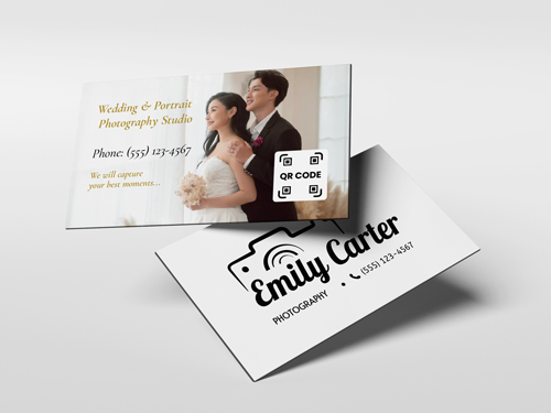 Painted edge business cards showcasing contact details and a wedding photo of a couple