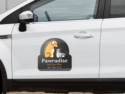 Personalized car magnet for a pet clinic displaying the logo and contact information.
