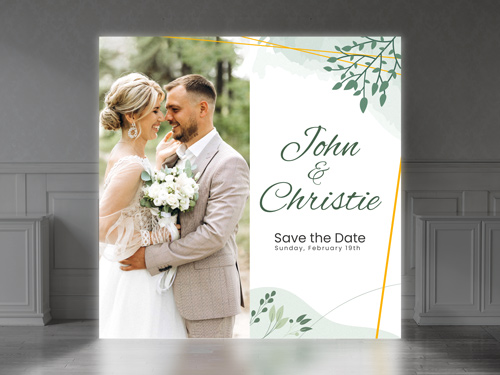 Wedding day SEG backlit popup display with bride and groom's image and names.