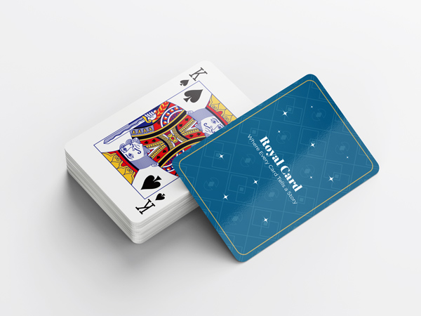 Sleek deck of playing cards with a blue patterned back and the King of Spades facing up
