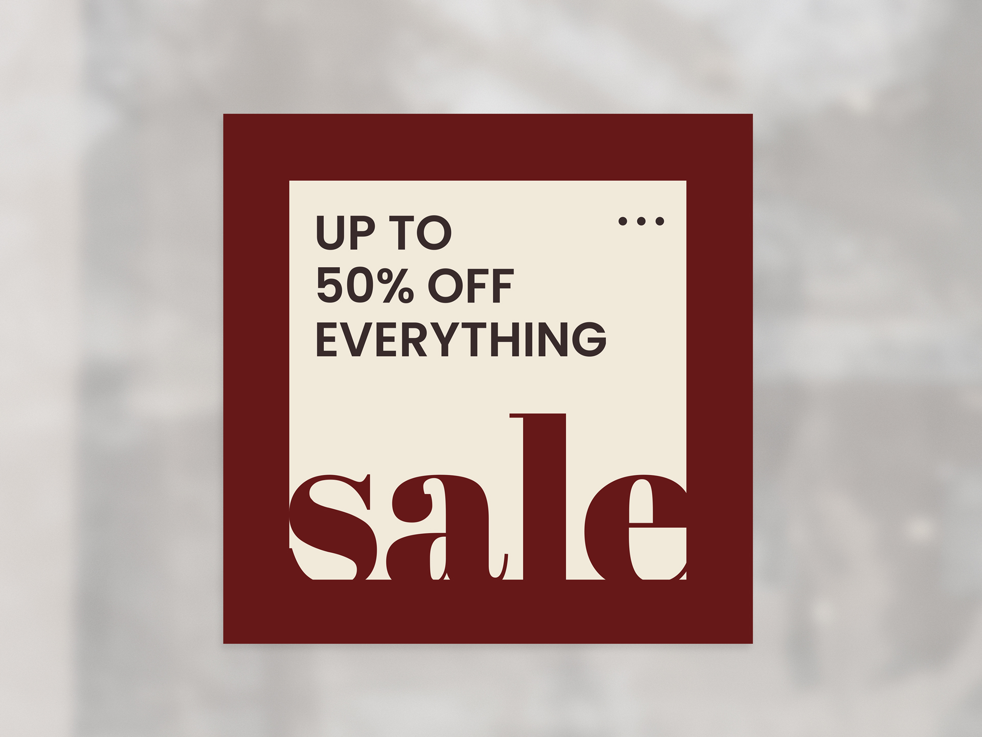 Retail window cling promoting sale with up to 50 percent off messaging.