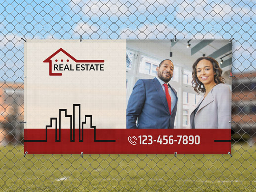 Hanging real estate mesh banner in red, black and white featuring people