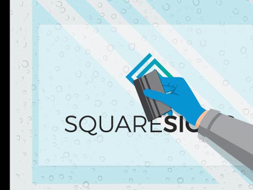 Installation step 8 - Using a squeegee to remove water from underneath the window decal