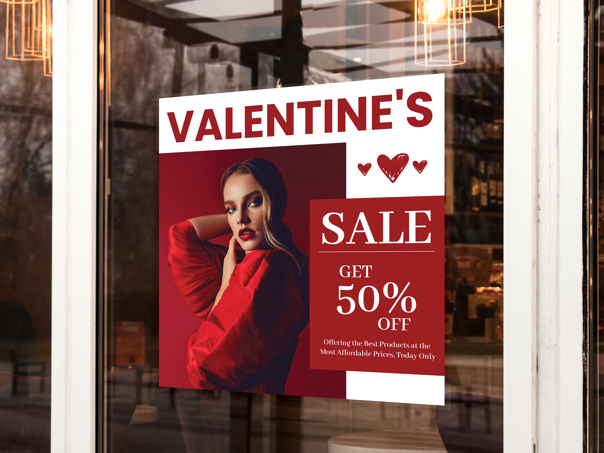Valentine’s Day retail window cling promoting sale with 50 percent off offer.