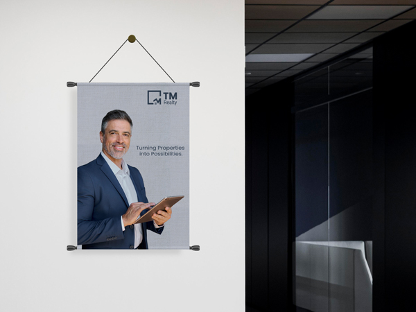 Professional rolled canvas prints showing smiling man in suit.