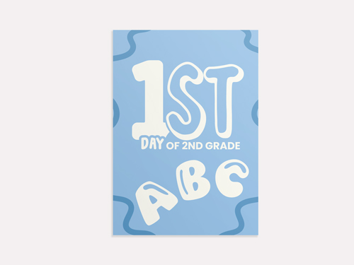 Vibrant back to school sign featuring first day second grade text with ABC letters.