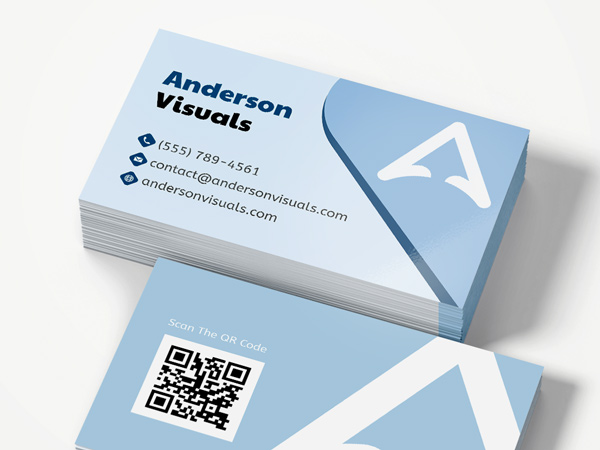Standard size business cards in baby blue, showcasing contact details