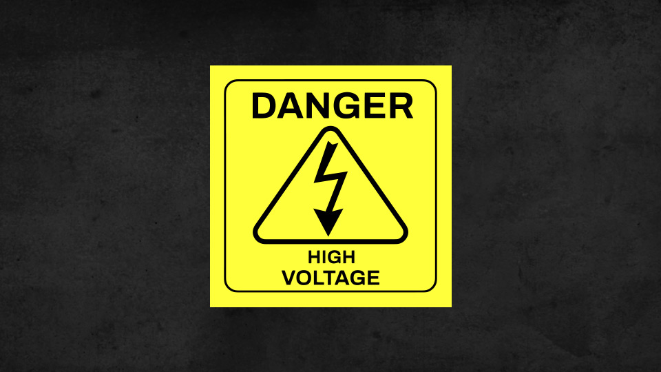 Yellow warning reflective decal with black graphics.