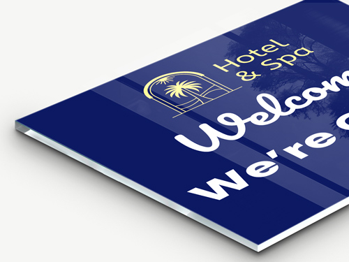 Welcoming acrylic printing reading Hotel and Spa on a navy blue background