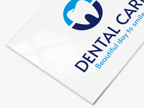 White acrylic sign for a dental clinic featuring the clinic's name and logo