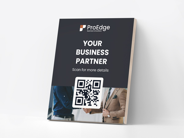 Company branding wooden sign with company name, slogan, and QR code.