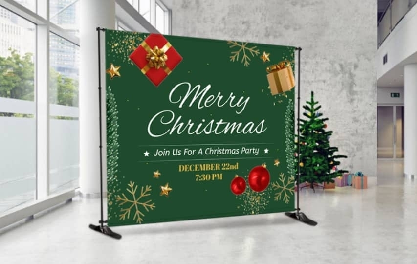 Merry Christmas green party backdrop showcasing festive details for the Christmas party.