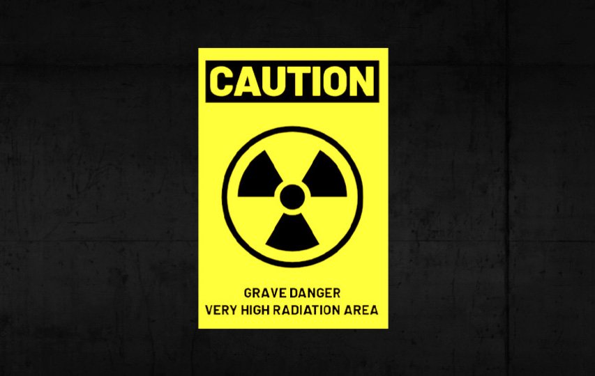 Yellow caution reflective lettering and decals with black radiation symbol.